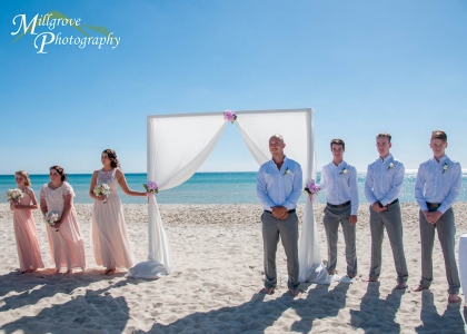 The whole bridal party at Carrum Beach, Melbourne
