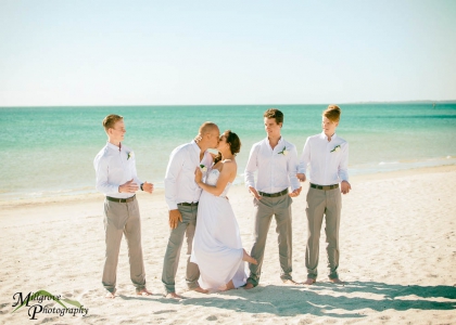 Bride and groom with groomsmen