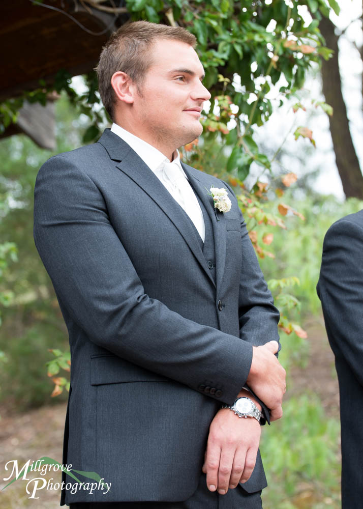 A groom waiting for the wedding to start