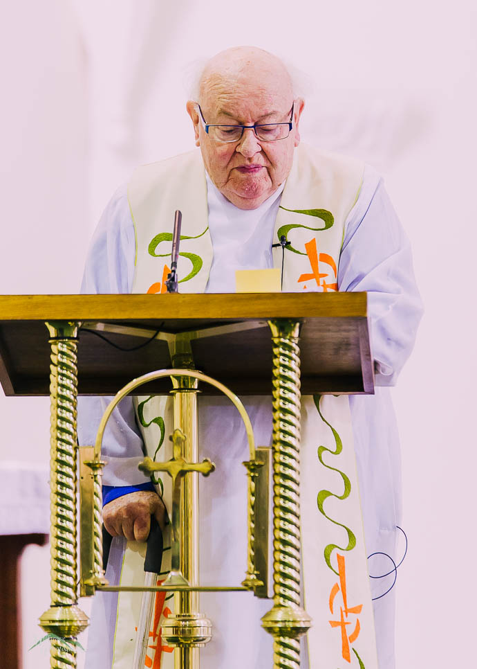 Father Bob Maguire performing a wedding ceremony