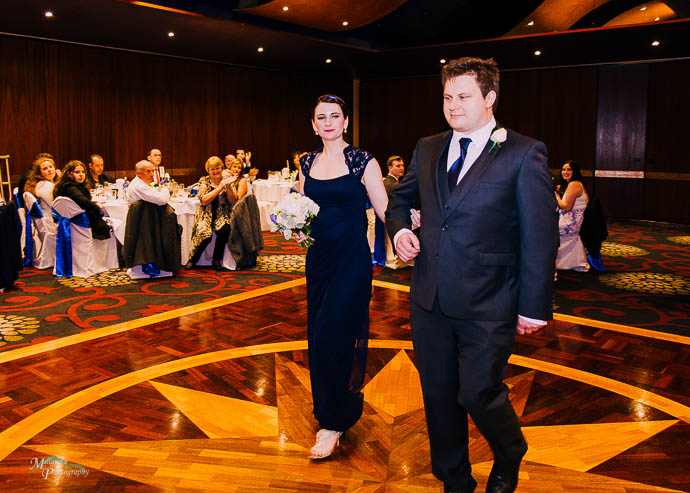 Bridal party entering the reception at Taylors Lakes Hotel