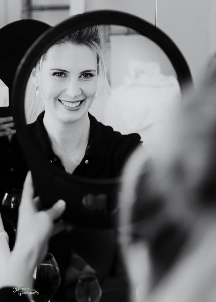 Bride in mirror, black and white