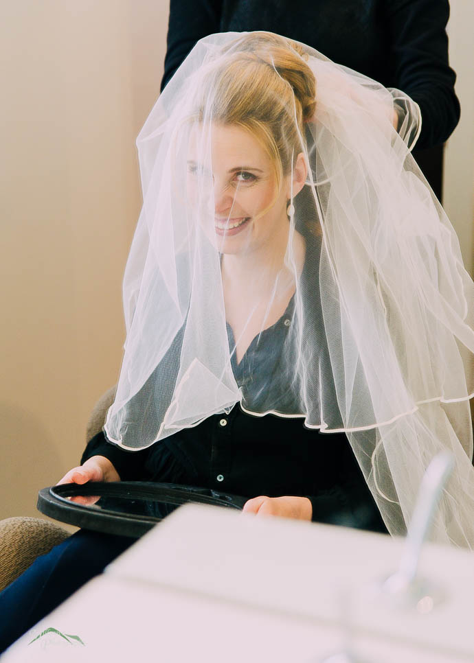 Smiling bride with veil