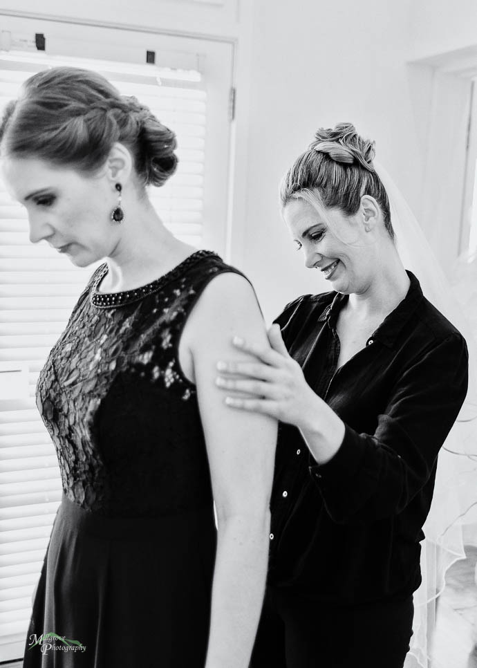 Bride and bridesmaid, black and white