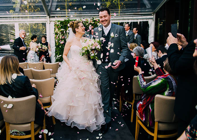 Rose petals thrown during ceremony on The Deck, Circa - The Prince