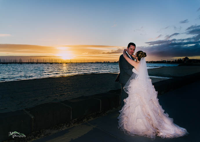 Sunset bride and groom at St Kilda