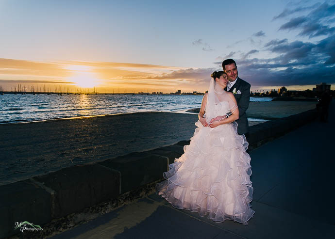 Sunset bride and groom at St Kilda