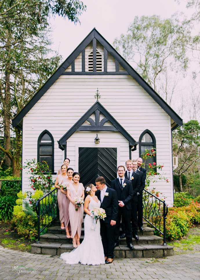 Bridal party outside the chapel at Chateau Wyuna