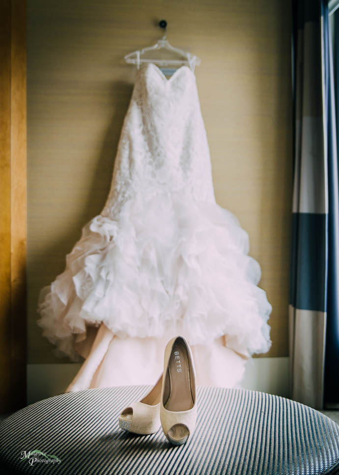 Wedding dress with shoes in the foreground