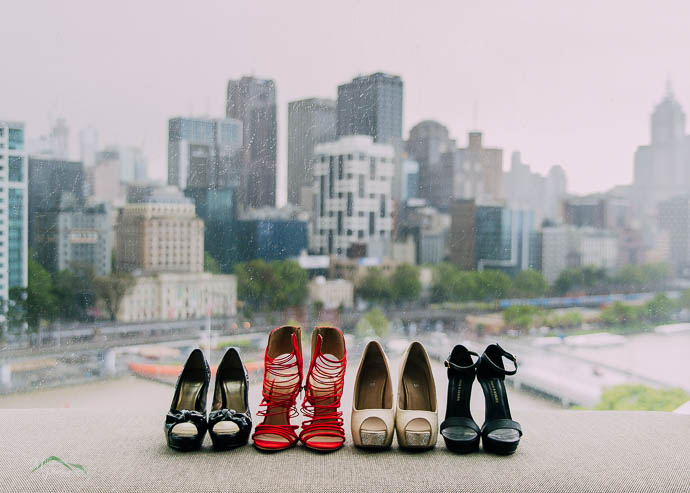 Shoes on a love-seat overlooking Melbourne