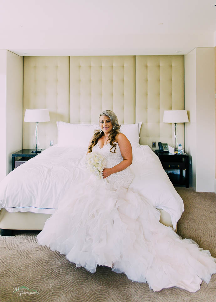 Beautiful bride sitting on her bide