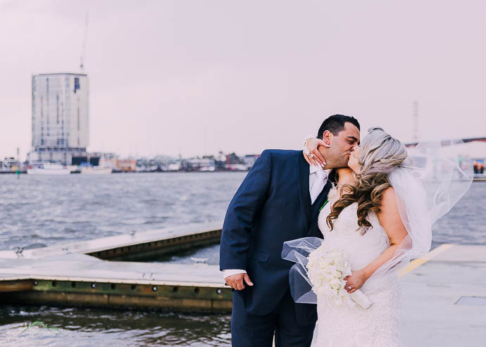 Bride and groom outside All Smiles Melbourne Waterfront on a co