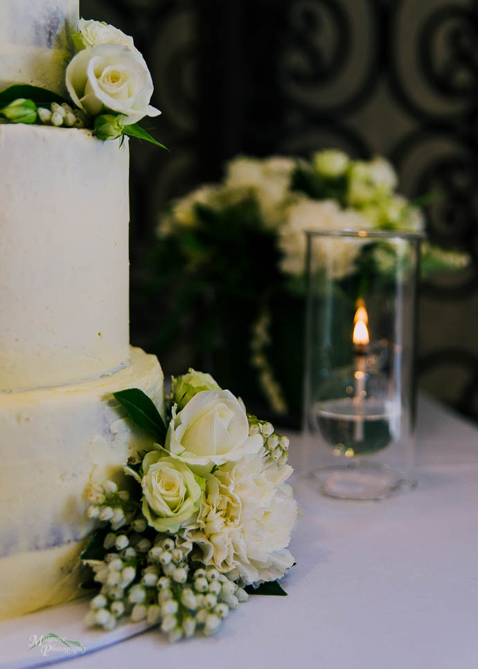 Cute candle in glass hoder with wedding cake