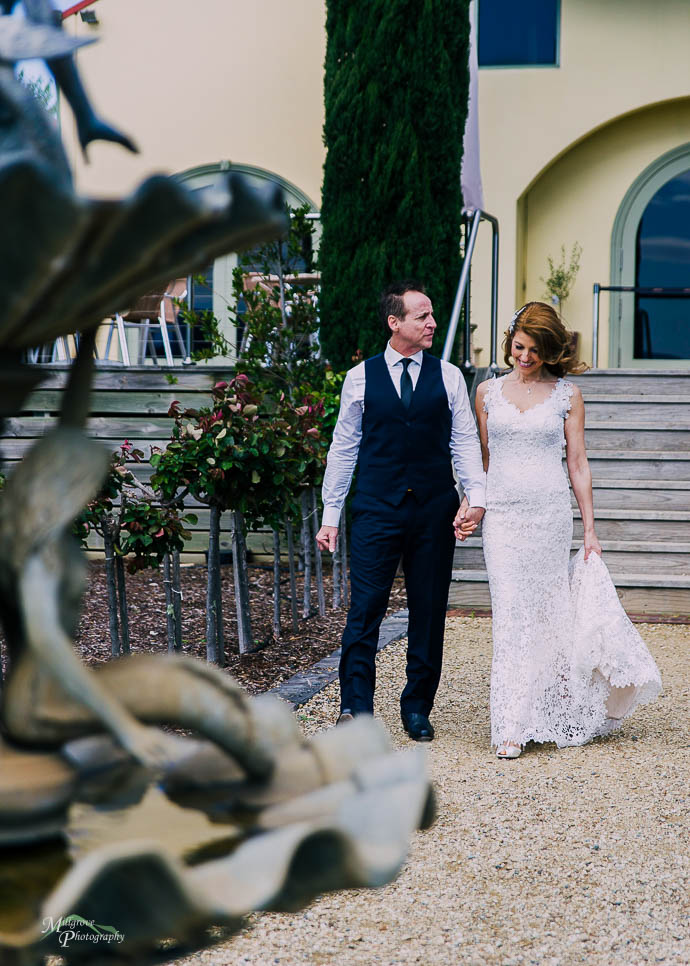 Bride and groom taking bridal shots at Tokar Estate, Coldstream