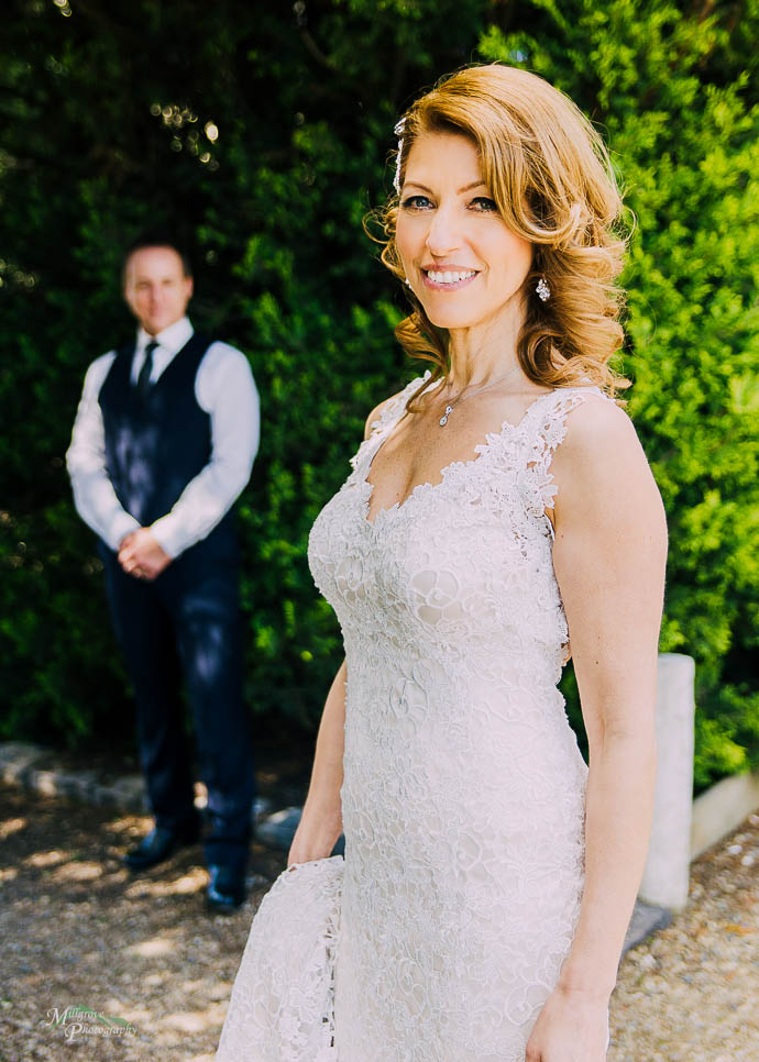 Bride and groom taking bridal shots at Tokar Estate, Coldstream