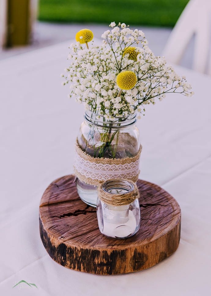 Pretty yellow and white flowers at a wedding