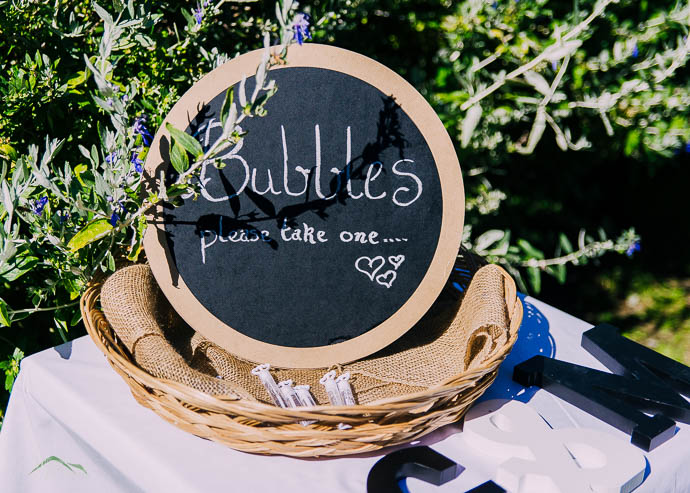 "Bubbles, please take some" sign