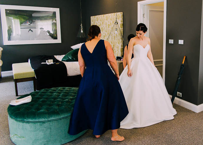 Bride getting ready in the bridal suite at Lake House, Daylesfor