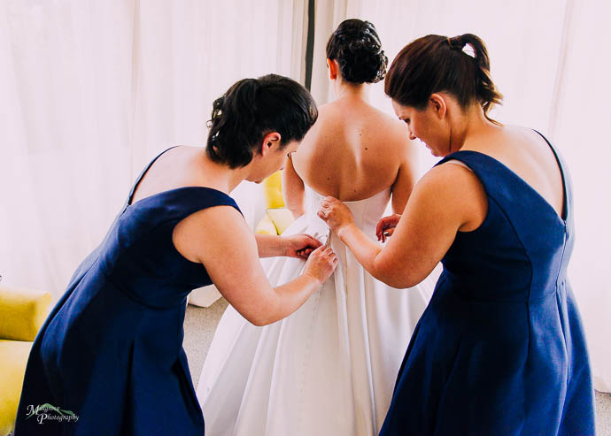 Bride getting ready in the bridal suite at Lake House, Daylesfor