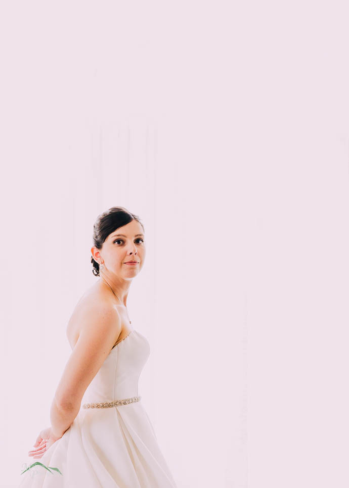 Bride getting ready in the bridal suite at Lake House, Daylesfor