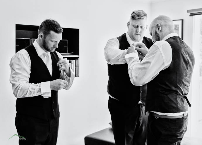Groom and Groomsmen getting ready pre-wedding at Lake House, Day