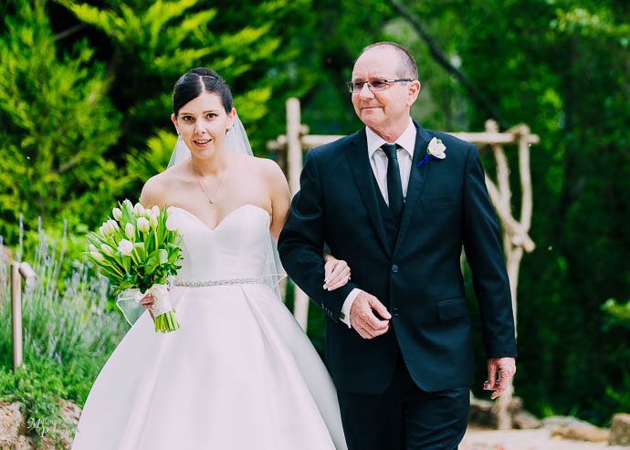 Bride walking down the aisle with her father at a Lake House, Da