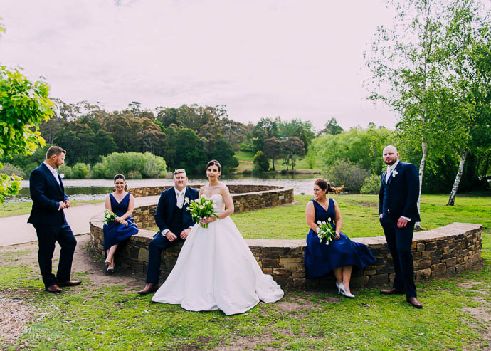 Bridal party by the lake at Lake House, Daylesford