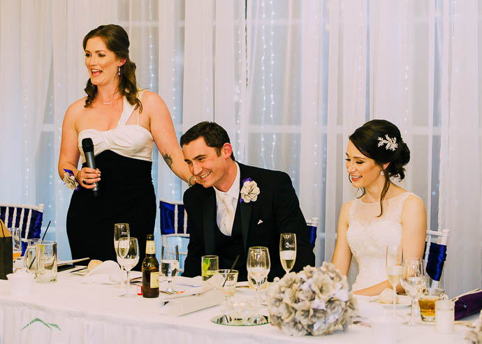 Person giving a speech at a wedding