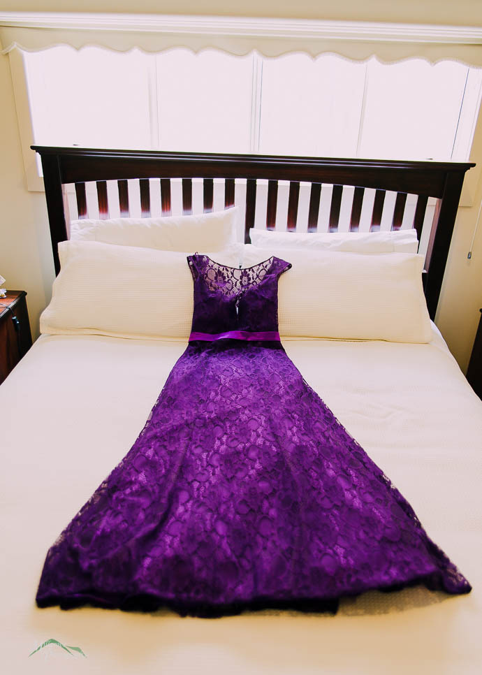 Bridesmaid dress on a bed