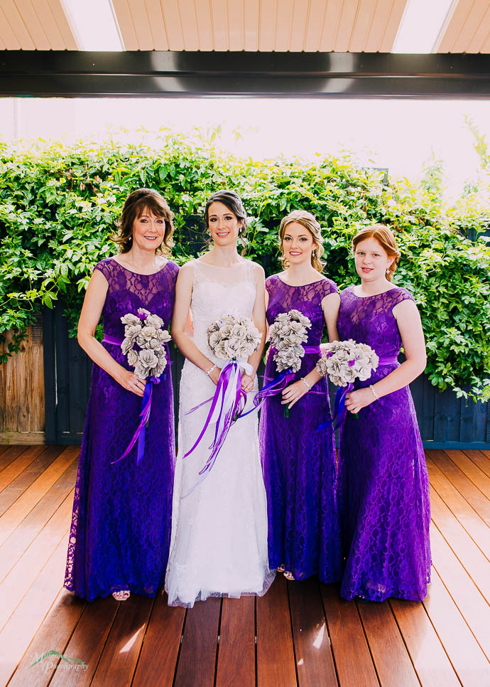 Bride and Bridesmaids outside on the deck