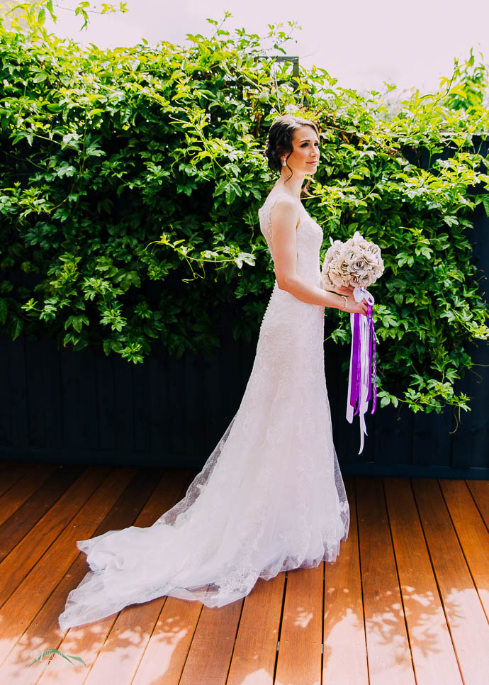 Bride posing on the deck