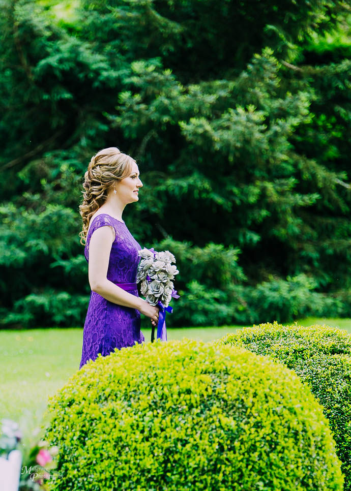 Bridesmaid walking down the aisle at Marybrooke Manor, Sherbrooke