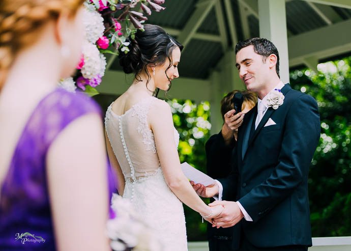 Groom saying vows at wedding