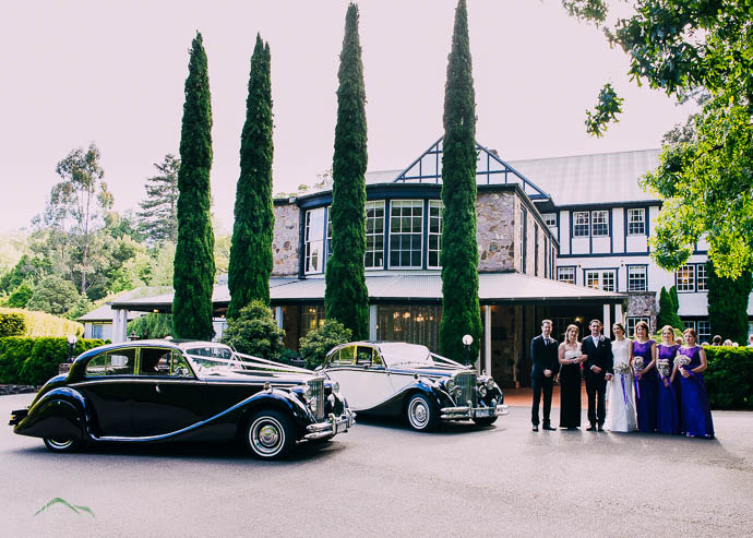 Bridal party with cars out the front of Marybrooke Manor, Sherbrooke