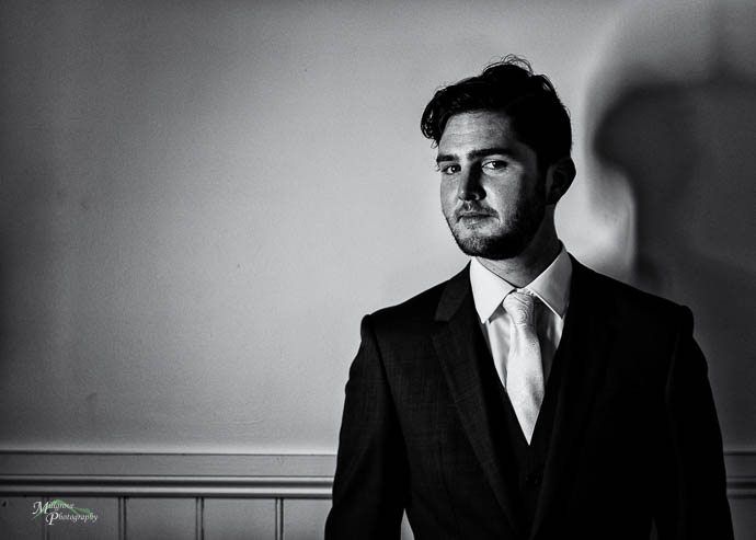 Black and white portrait of Groom
