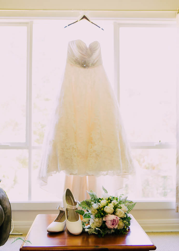 Bride’s shoes with Bridesmaids shoes behind