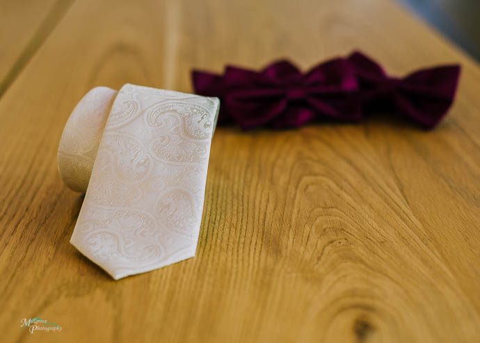 Wedding tie with 4 bow ties in background