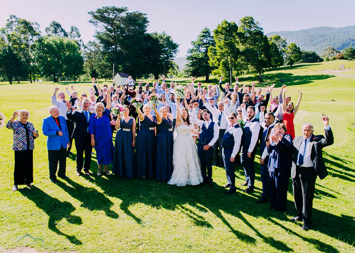 Group shot at Warburton Golf Club with mountains in background