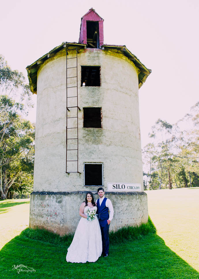 Bride and Groom in front of the silo at Warburton Golf Club