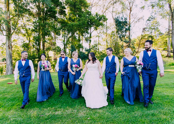 Bridal party walking together at Warburton Golf Club