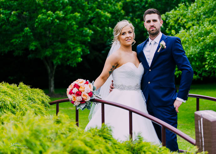 Bride and Groom on the little bridge at Wild Cattle Creek Winery