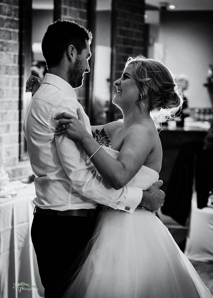 Bride and Groom sharing first dance at Wild Cattle Creek Winery