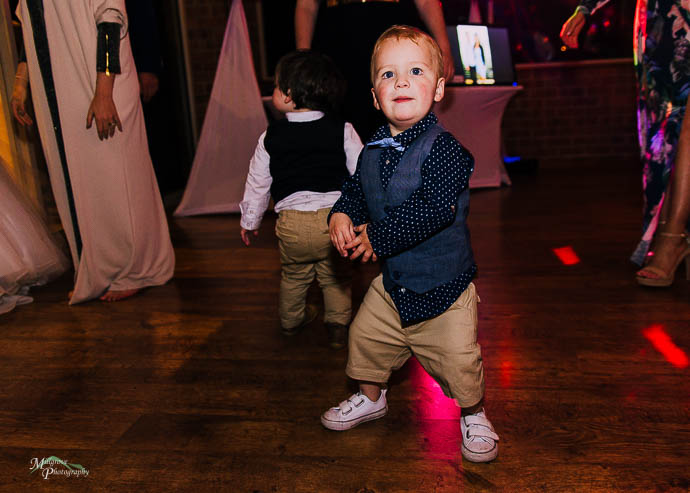 Candid moments of people dancing during the reception at Wild Cattle Creek Winery