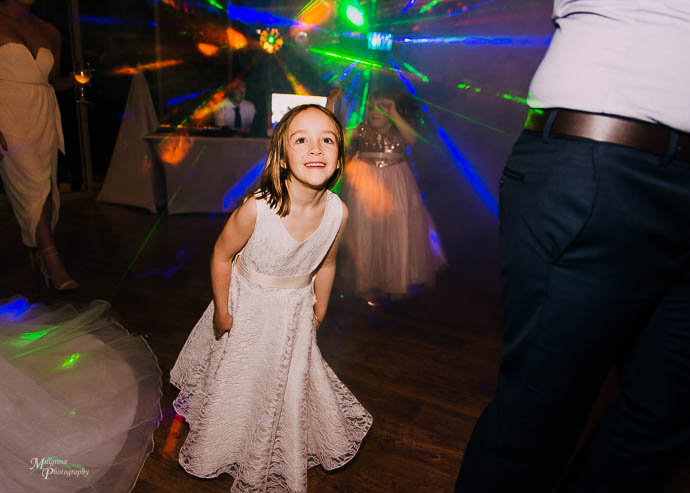 Candid moments of people dancing during the reception at Wild Cattle Creek Winery