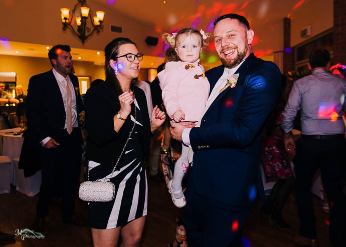 Candid moments of people dancing during the reception at Wild Cattle Creek Winery