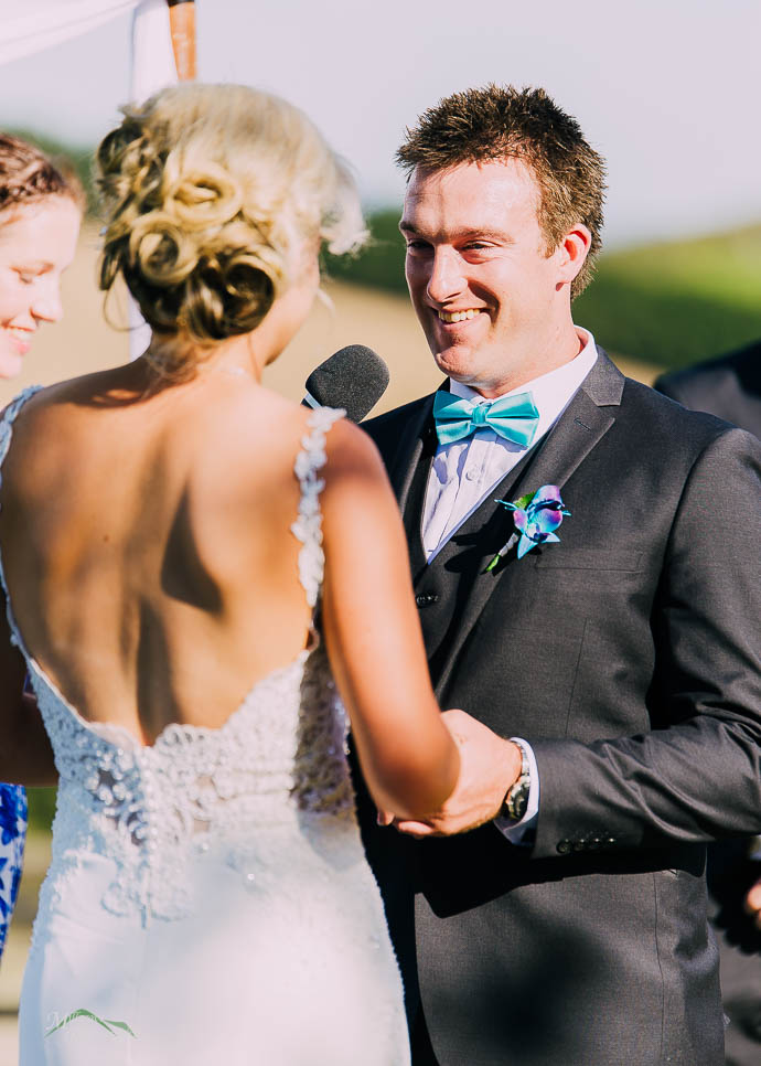 A groom saying his vows at a Riverstone Estate Wedding