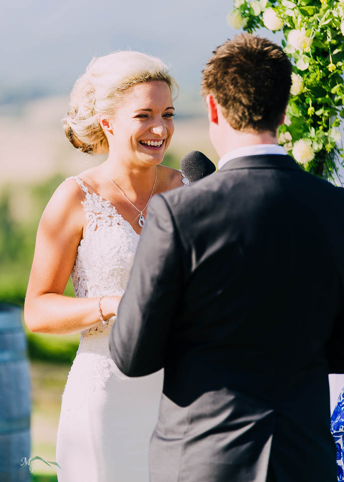 A bride saying her vows at a Riverstone Estate Wedding