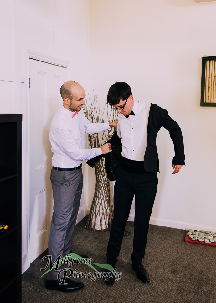 Groom and groomsmen getting ready for a wedding