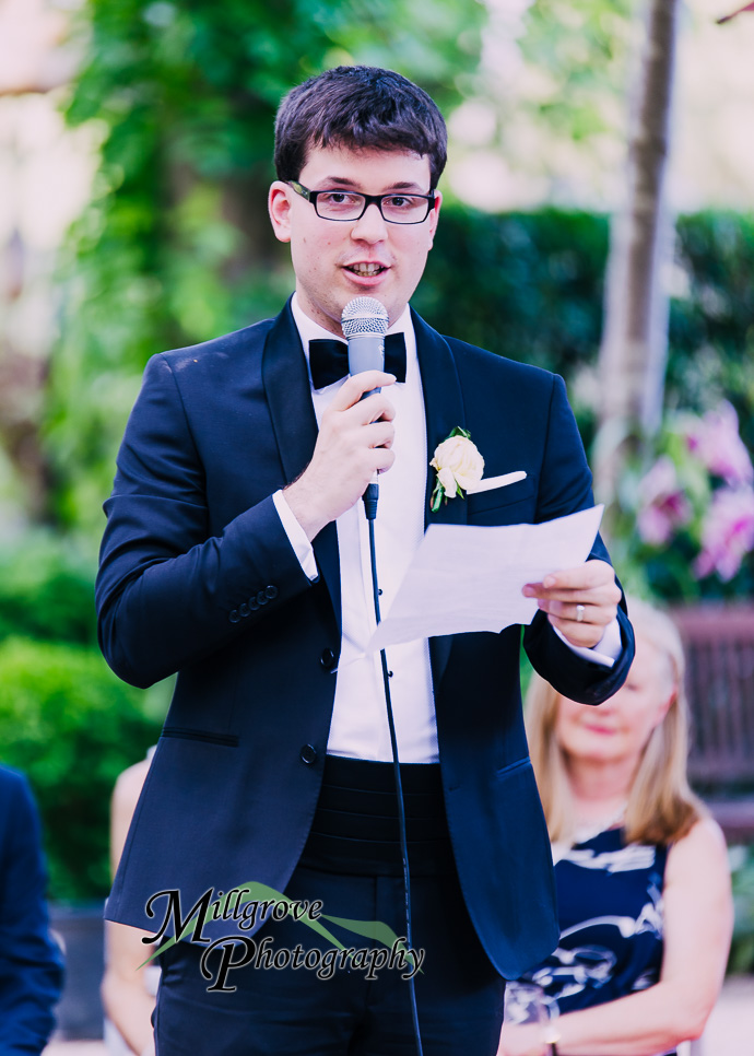 Guests giving speeches at a wedding