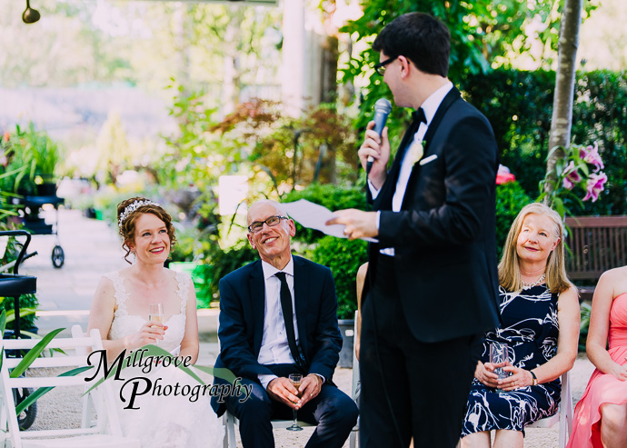 Guests giving speeches at a wedding